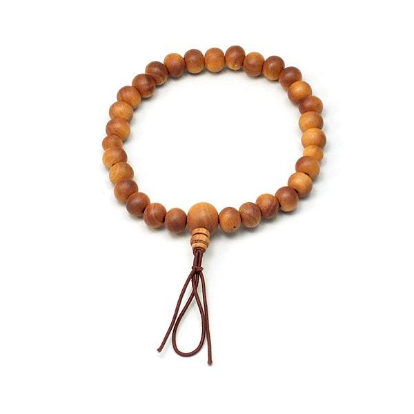 珠の素材：白檀 7mm玉腕輪直径：6cm（男女兼用）内寸法：約16cm備考：プラスチックケース入り腕輪念珠は、厄除けや所願成就のお守りとして手首につける念珠です。白檀(びゃくだん)は、古くから香りの良い希少な香木として知られ、線香の材料や仏...