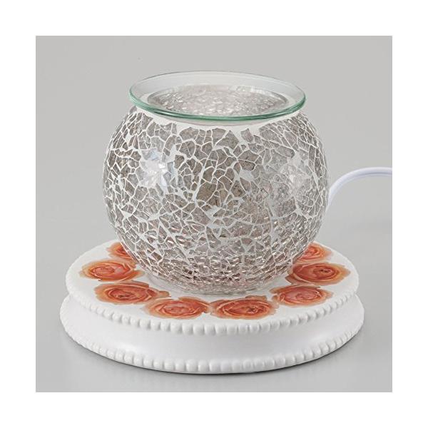 【ご購入後の当店からの連絡はご登録のメールアドレスに通知いたします。必ずご確認ください】可愛いお花の絵柄の土台の上に、モザイクのシェードが素敵なアロマライトです。上部の受け皿にお好みのアロマオイルを数滴たらせば、やわらかな灯りとともにアロマ...