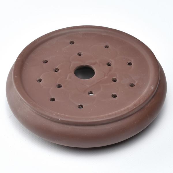 蓮の花の図案の底のないタイプの壺置です。