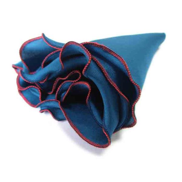 フチ糸を２色使った当店オリジナルの縫製技術が繊細でおしゃれです。単純なシングルのラウンドチーフと比べればその差は歴然。フチを出さずに使えば普通のチーフとしても使用できます。ＴＯＫＩチーフ最多の１８色展開になります。サイズ：直径約28cm  ...