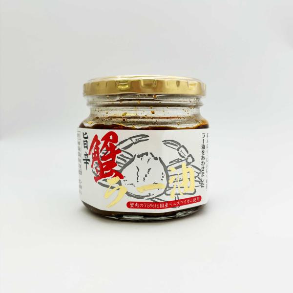 ベニズワイガニほぐし身に、にんにく・にんにくの芽・ラー油をあわせました。[製造者](株)ナガトク　長野県長野市[賞味期限]約4〜5ヵ月[原材料]粒状大豆たんぱく（国内製造）、植物油脂、べにずわい蟹肉、醸造調味料、めかぶ茎、にんにく、唐辛子、...