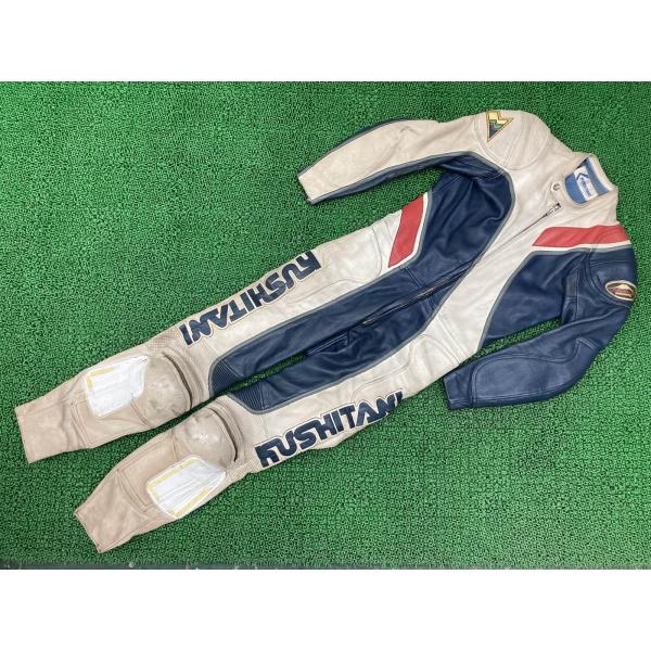 KUSHITANI クシタニ レーシングスーツ 革ツナギ未使用 クシタニ製 レーシングスーツ 白/赤/青 社外 中古 バイク 部品