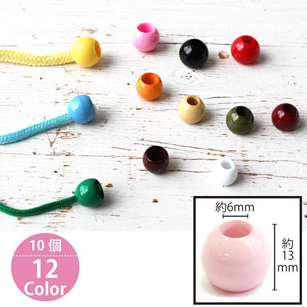 サイズ: 外径 W15xH1.3mm・上穴Ф6mm 下穴Ф9mm素材: プラスチック樹脂入り数: 10個アクリルコード（ひもの）結び目を隠すためのパーツです。巾着袋等によく使用されています。※DY250 アクリルコード 約6mm と合わせて...