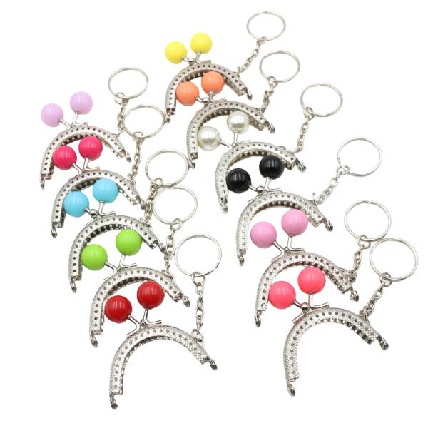 あめ玉がかわいい がま口です。ポーチ、小物入れ、お財布のハンドメイドに！型紙などは付属しておりません。■サイズ全長: 縦54mmｘ横53mm口金幅: 5cmリング直径: 25mmチェーン長さ: 約30mmあめ玉サイズ：直径14mm開閉の硬さ...