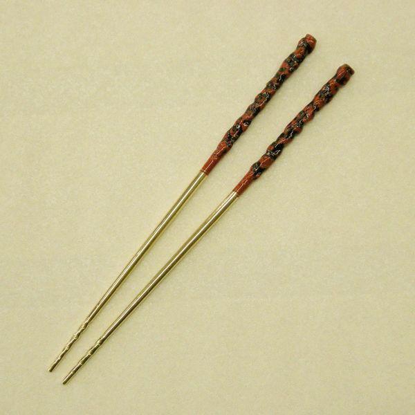 高級感のある砲金製の火鉢用火箸です。長さ27cm