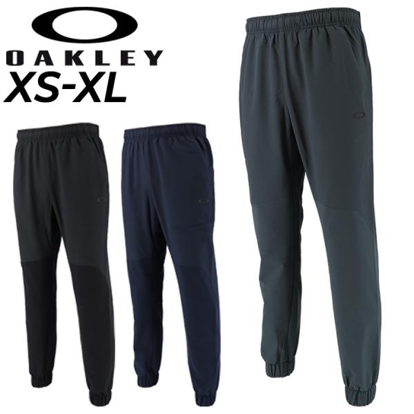 OAKLEY グレー スリムフィットパンツ OAKLEY オークリー 撥水 防風 ストレッチ ロングパンツ ジョガー