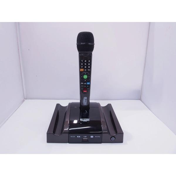 シリアル番号：005101940パーソナルカラオケONSTAGEPK-NE02W内蔵曲900曲のボリューム、HDMI対応で鮮明な画像リモコンがついて演奏、加焼酎でも曲の選択ができます。別売りの「ポップス＆歌謡曲100曲目追加チップ」が付属し...