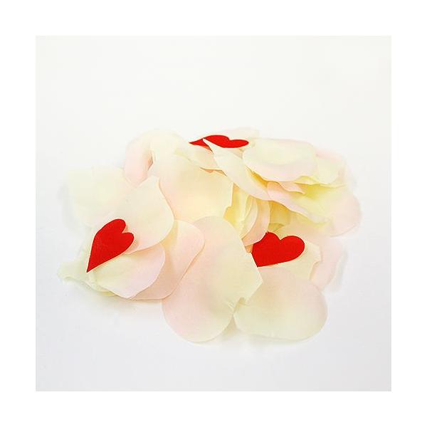 パーティーを盛り上げる重要なアイテム、フラワーシャワー用の布製ローズペタル（バラの花びら）。赤いハートが入っていて、花びらと共に空にヒラヒラ舞うハートはとってもキュート。ドレスや床を汚さず、後片付けもとっても簡単です。受付や通路のデコレーシ...