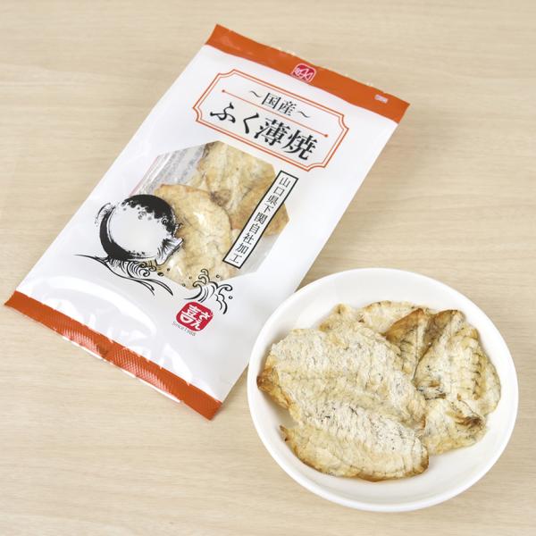 メール便なら送料無料（1配送1セットまで）1mmまで薄く仕上げた最高の肴旨味を凝縮した国産のふぐを丹念に焼き上げ専用の機械で1mm程度になるまで薄く仕上げました。このままおつまみとしてはもちろんのこと、酢の物の材料として、細かく刻んでふりか...