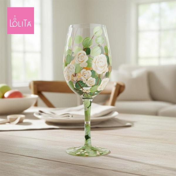 シックなトーンにまとめられた白いバラのグラス。白ワインにぴったり映えます。お花の香りのワインタイムを楽しんで。キュート&amp;ポップ！ エネルギーに溢れ、人生をめいっぱい楽しむ女性のためのデザイン・ワイングラス。美しくドレスアップされたグ...