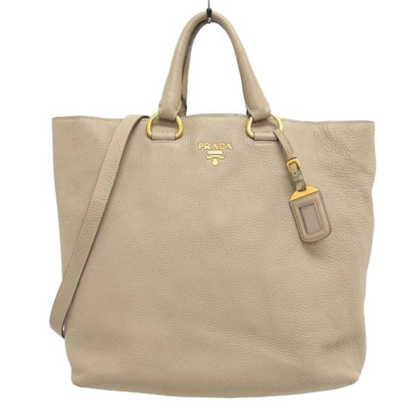 PRADA プラダ パンチングロゴ ベージュ レザー トートバッグ - バッグ