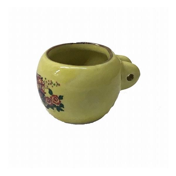 【特徴】 ・チョコかけ不要の耳付きのチョコです。・すり餌などを与えるときにお使いください。【仕様】 ・サイズ：約φ45×高さ約39mm　（口径は約32mm）・カラー：黄色・材質：陶器※手作りのため、大きさにバラつきがあります。