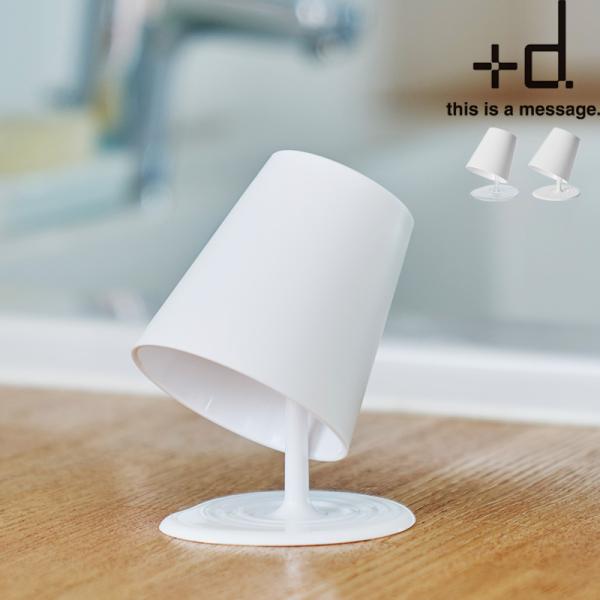 「コップがさかさまになって宙に浮けばいいのにな」そんなアイデアから生まれたコップ＆スタンド。コップから液体がこぼれ出ているようなユニークなデザインは使うたびに楽しめます。まるで本物のような造形の波紋は、滴った水をキャッチするので洗面台が濡れ...