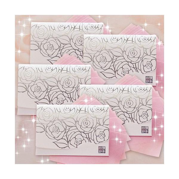 シルバーのバラに純白のしっかりした紙ケース。銀色の箔押しでバラが描かれています。ケースを手に持つとバラの箔押し部分がゴージャス。５冊セット　ばらの香り付き