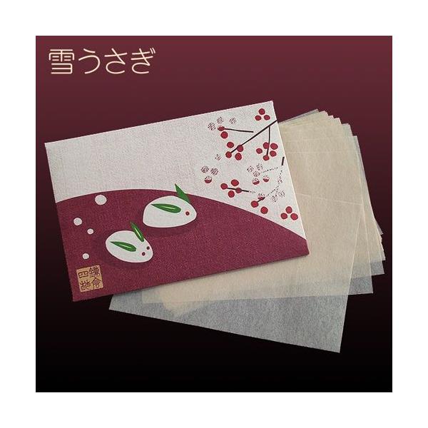 葉っぱの耳がカワイイ雪うさぎに、赤い実の南天を添えた、冬のなごみの和風パッケージ