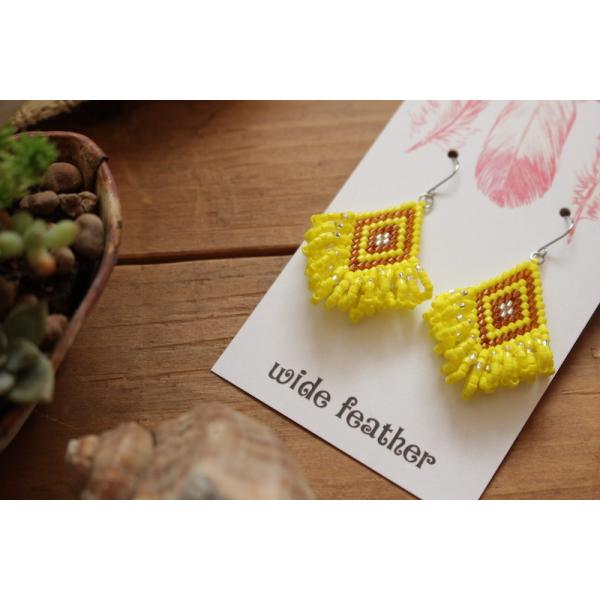 ピアス　オルテガループフリンジ (キイロ)