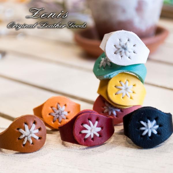 Zenis(ゼニス）の本革リングです。ナチュラルレザー（牛革）を使用しています刺繍のワンポイントとブランドロゴの刻印が、かわいいアクセントです丁寧に１点づつ職人の手で仕上げています使い込むほどに色が深みをまして、光沢も出てきますシンプルなデ...