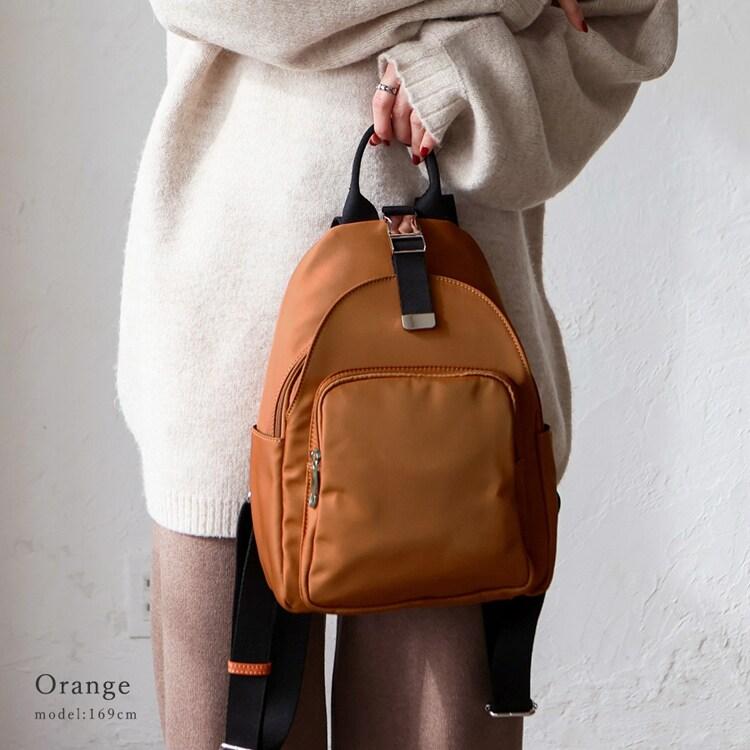 【関税込み】ロゴプレート付き ミニナイロンバックパック ロゴプレート 6ポケット付き シンプルバックパック[品番