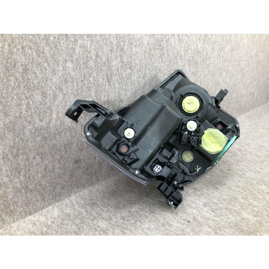 ムーヴ カスタム LA150S前期左ライトKOITO 100-69010