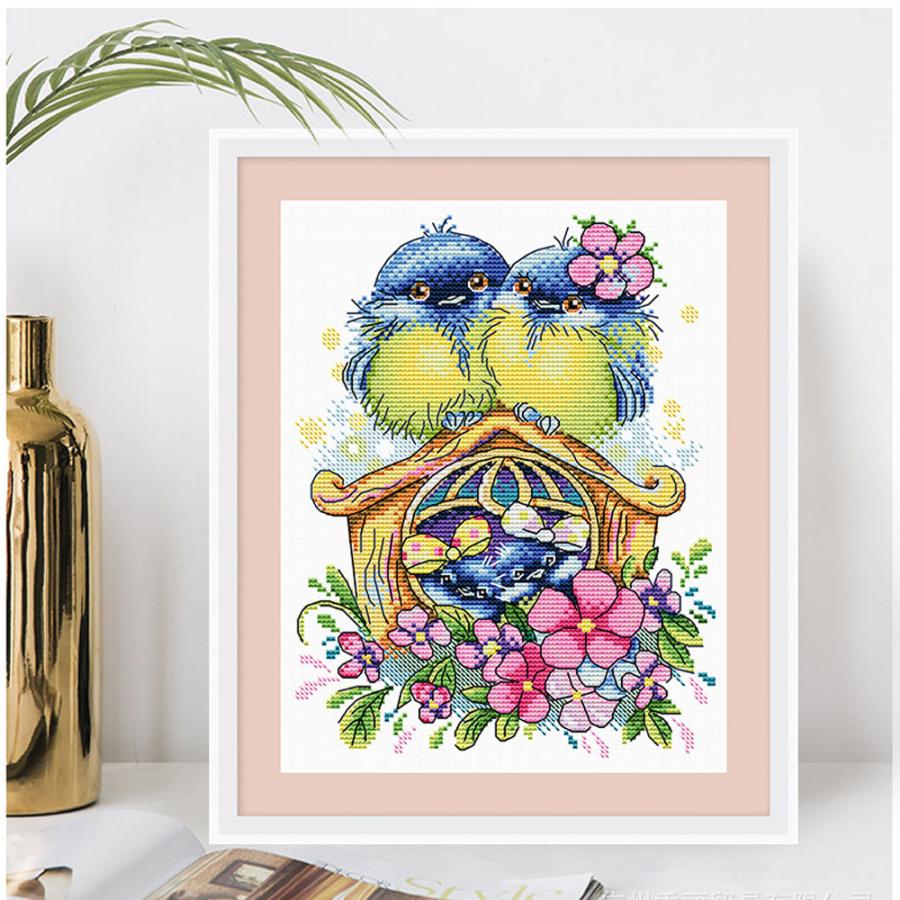 鹿の油彩画 鹿が水彩画を描く。鹿の美しい鹿の絵と色のしぶき、青と緑の背景