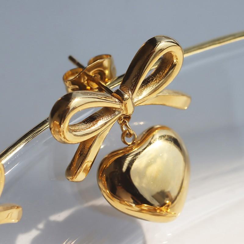 ピアス ハートリボンピアス 揺れる ミックス ゴールド シルバー 金属