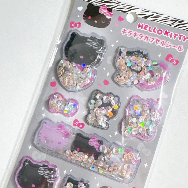 ハローキティ シール キラキラカプセルシール ステッカー 正規品 ケイカンパニー サンリオ Sanrio 日焼けキティ ヒョウ柄 ゼブラ柄 ラメ メール便 sdktkcp |  | 07