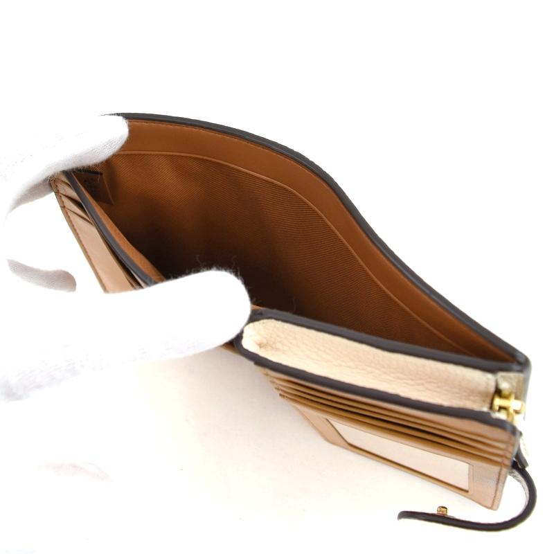 コーチ COACH シグネチャーレザーアップルプリント 二つ折り財布 COACH（コーチ） 二つ折り財布 総柄 りんごモチーフ アップル柄 レザー