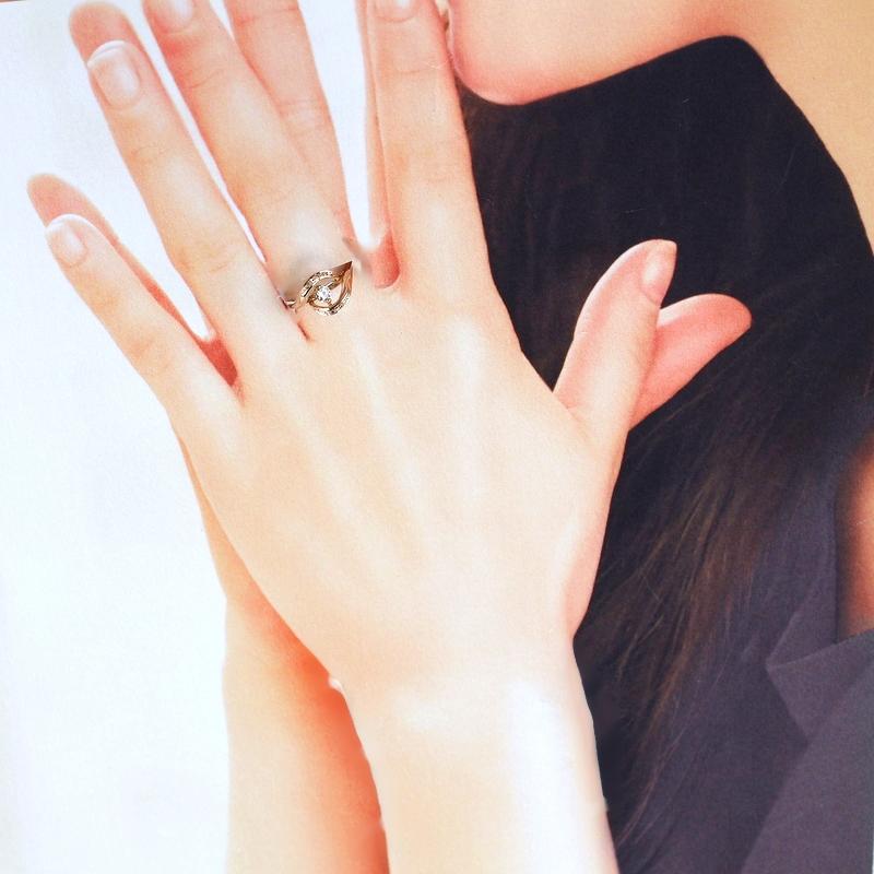 ダンシングストーン リング K18PG ダイヤモンド 0.23ct 12号