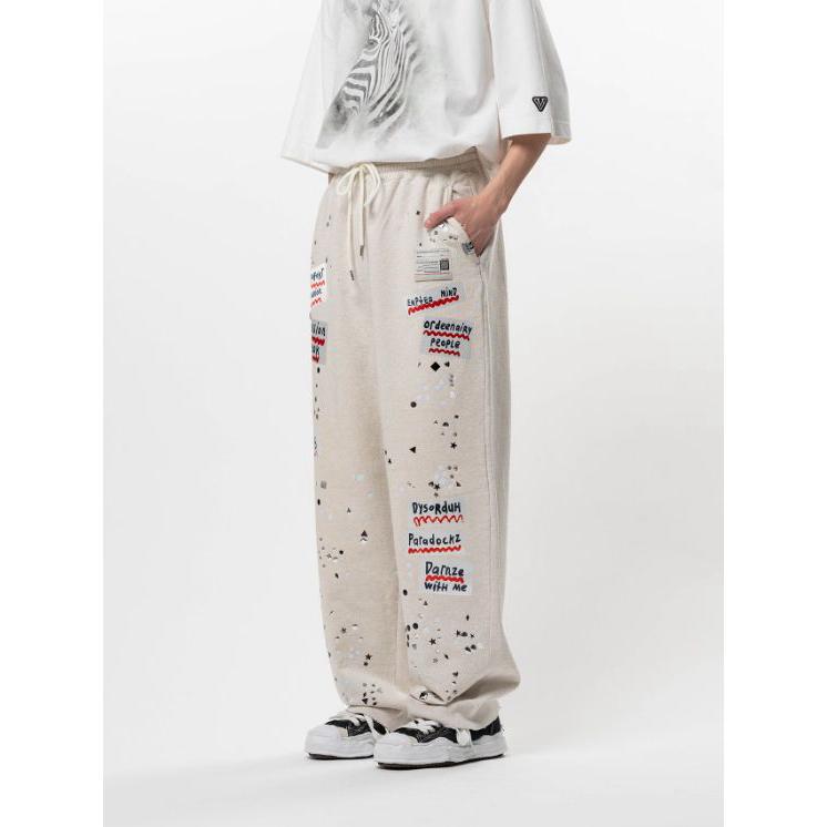 メゾン ミハラヤスヒロ / Maison MIHARA YASUHIRO エンベリッシュド ステッカー スウェット パンツ - Embellished Sticker Sweat Pants (WHITE)の画像