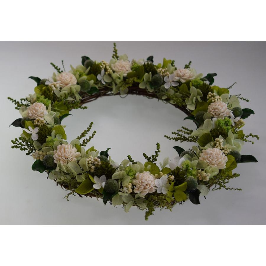 ドライフラワーリース 白のソーラーフラワーにグリーン系の小花で