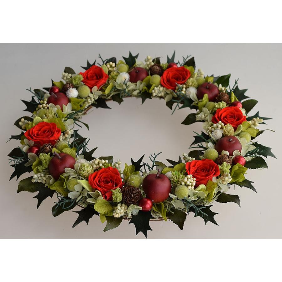 ヒイラギの葉のクリスマスリース プリザーブドフラワーの赤いバラとリンゴ ギフト プレゼント 誕生日 開店祝 引越し祝 Oxkb 愛彩祭 フラワーリースのお店 通販 Yahoo ショッピング