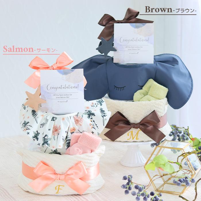 出産祝い Elodie エロディ お食事エプロン 3段おむつケーキ 送料無料 ハンドタオル スタイ おもちゃホルダー ベビーソックス　B100の画像