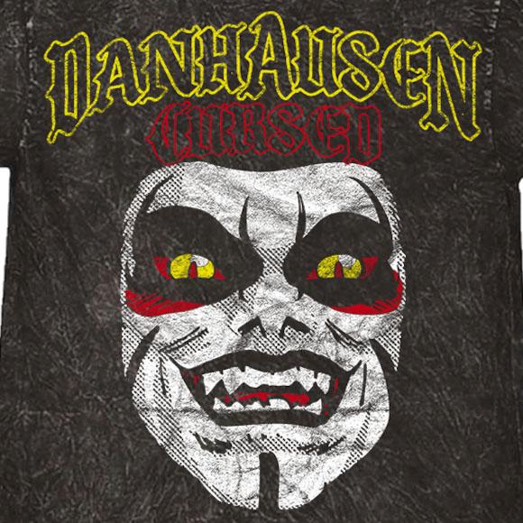 ダンハウゼンモデル 海外取寄 WWE AUTHENTIC Tシャツ CURSED! MINERAL