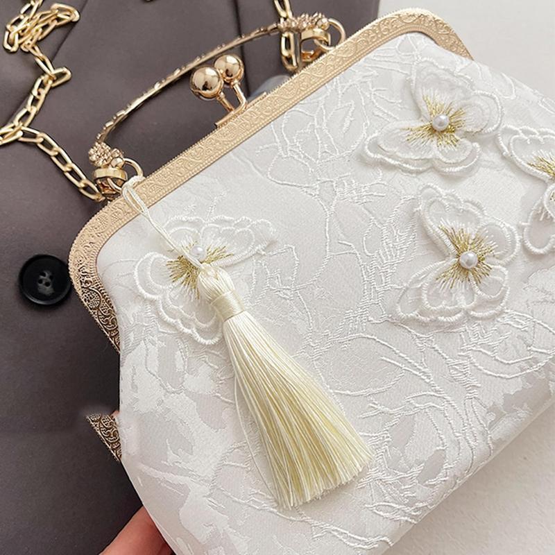 手持ちバッグ がま口 白 ホワイト 立体蝶 結婚式 刺繍 タッセル