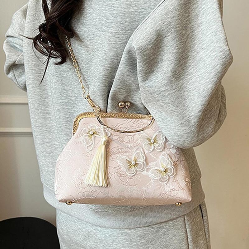 手持ちバッグ がま口 白 ホワイト 立体蝶 結婚式 刺繍 タッセル