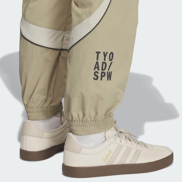 アディダス メンズ ロングパンツ ウィンドブレーカー adidas M VERBIAGE ウーブンパンツ 裏地なし ボトムス 男性 ルーズ ウィンドパンツ スポーティ /P4286の画像