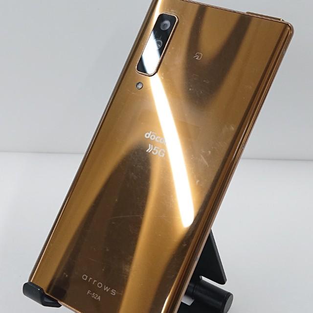 ジャンク品】arrows NX9 F-52A docomo ゴールド 送料無料 即決 本体
