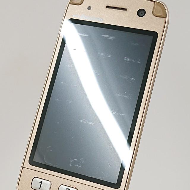 らくらくホン7 F-09B ドコモ ゴールド 送料無料 即決 本体 c15761
