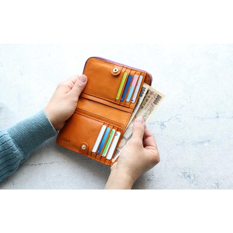 Dakota 二つ折り財布 クロコ型押し 外付けラウンドファスナー Dakota 二つ折り財布 クロコ型押し 外付けラウンドファスナー