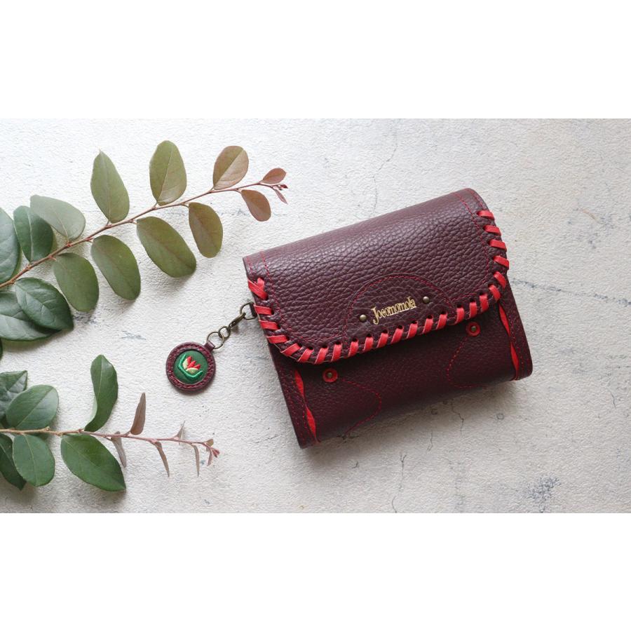 Jocomomola（ホコモモラ） 二つ折り財布 かぶせデザイン 革かがり