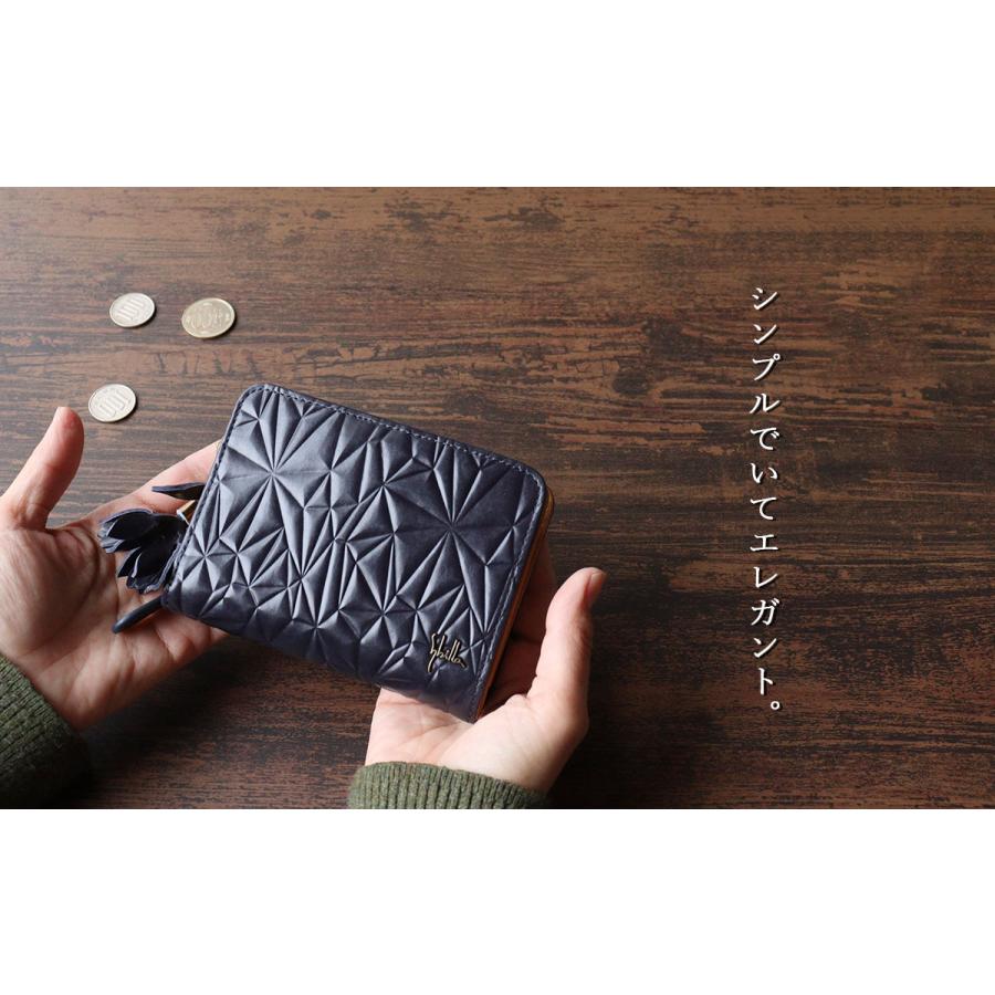 Sybilla（シビラ） 二つ折り財布 幾何学 花 レザーチャーム フリンジ