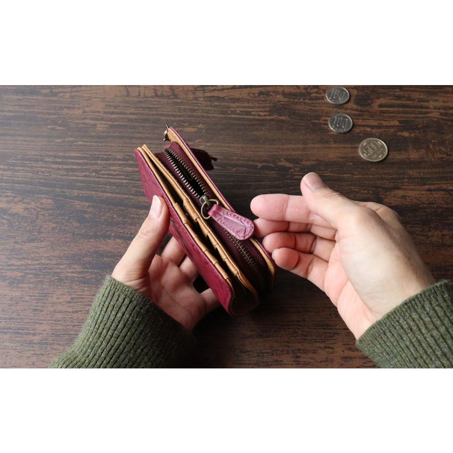 Sybilla（シビラ） 二つ折り財布 幾何学 花 レザーチャーム フリンジ