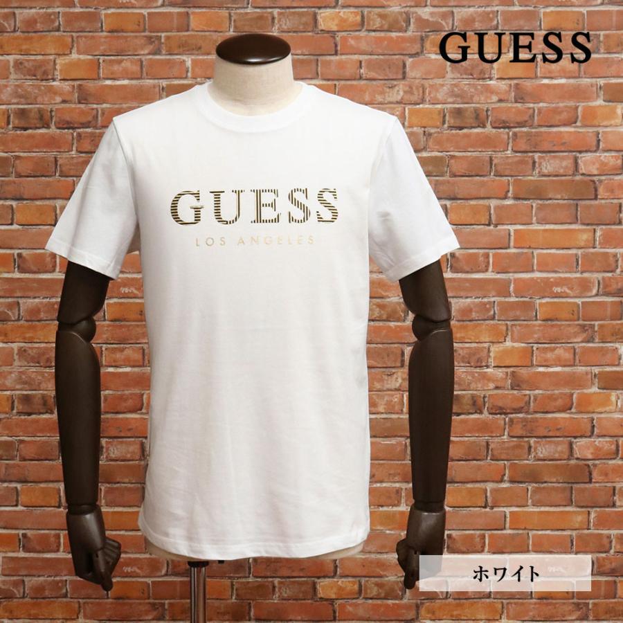 ホワイト 半袖 Tシャツ 金色ロゴ サイン GUESS（ゲス） 半袖Tシャツ KM2K1423 ロゴプリント ゴールド