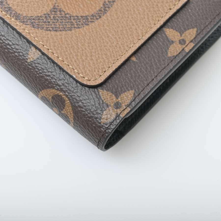 39750円 世界的に有名な ルイヴィトン ポルトフォイユ ジュリエット 二つ折財布 ジャイアント モノグラム