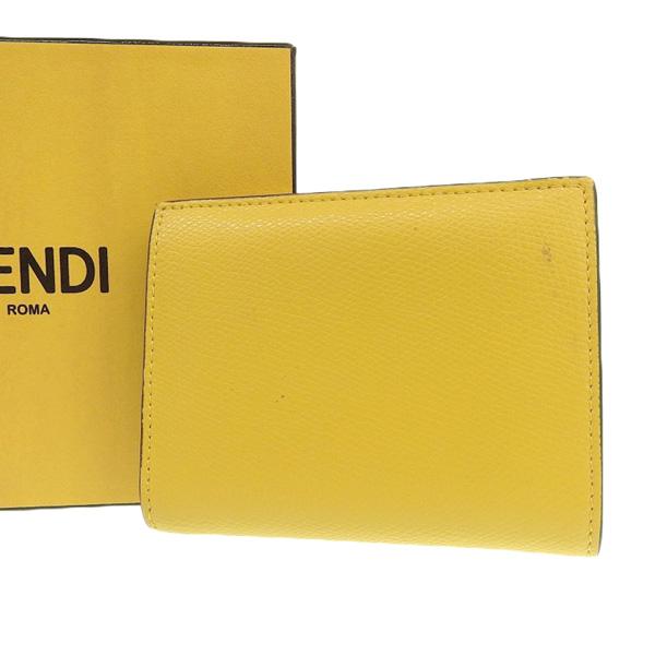 FENDI 二つ折り財布 イエロー フェンディ“鮮やかイエロー”のメンズ財布、“セレリア”ステッチ
