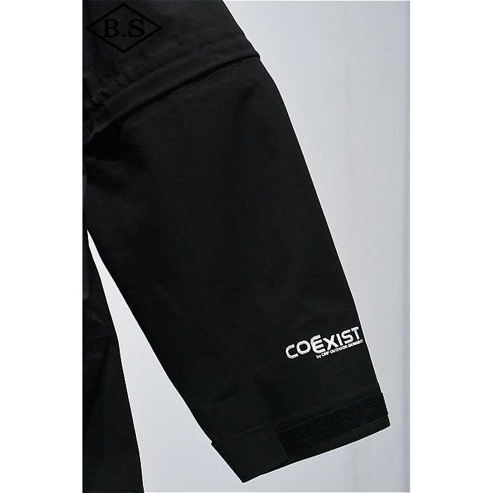 シーエムエフ アウトドアガーメント CMF OUTDOOR GARMENT アウター CMF2501-J05C GUIDE SHELL COEXIST BLACKの画像
