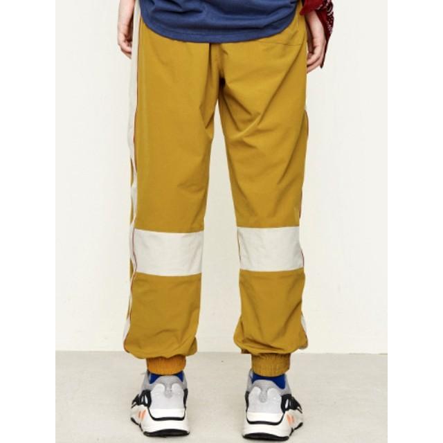 Dezzn ディズーン デジーン Botoms ボトムス リビバリズムトラックパンツ ネイビー イエロー Revivalism Track Pants In9334s Navy Yellow カジュアル Dezzn 6 Battleline 通販 Yahoo ショッピング