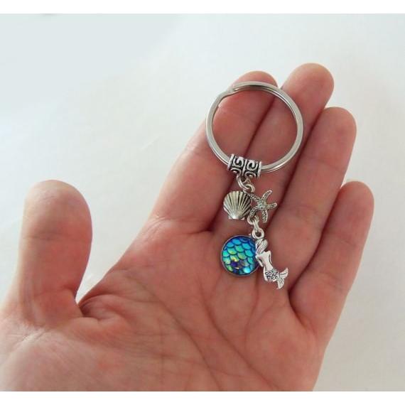 キーホルダー マーメイド シェル ヒトデ ウロコの色が虹色に変わる