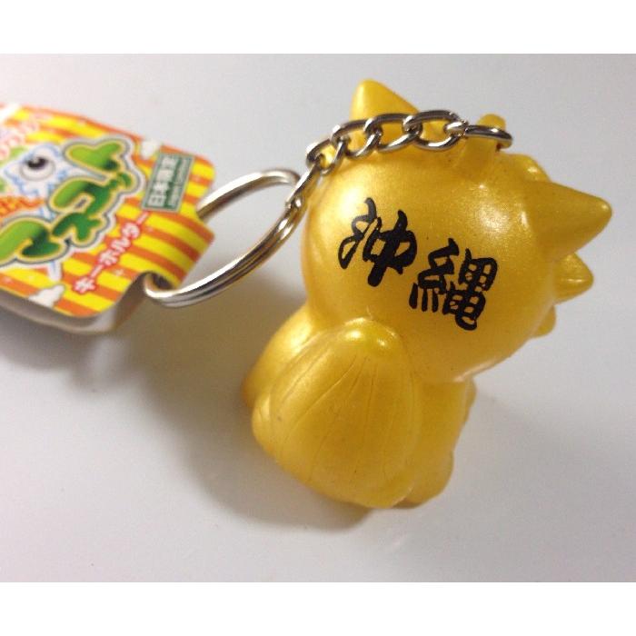 キーホルダー 金色 オレンジ色シーサー 沖縄限定 目玉が飛び出る