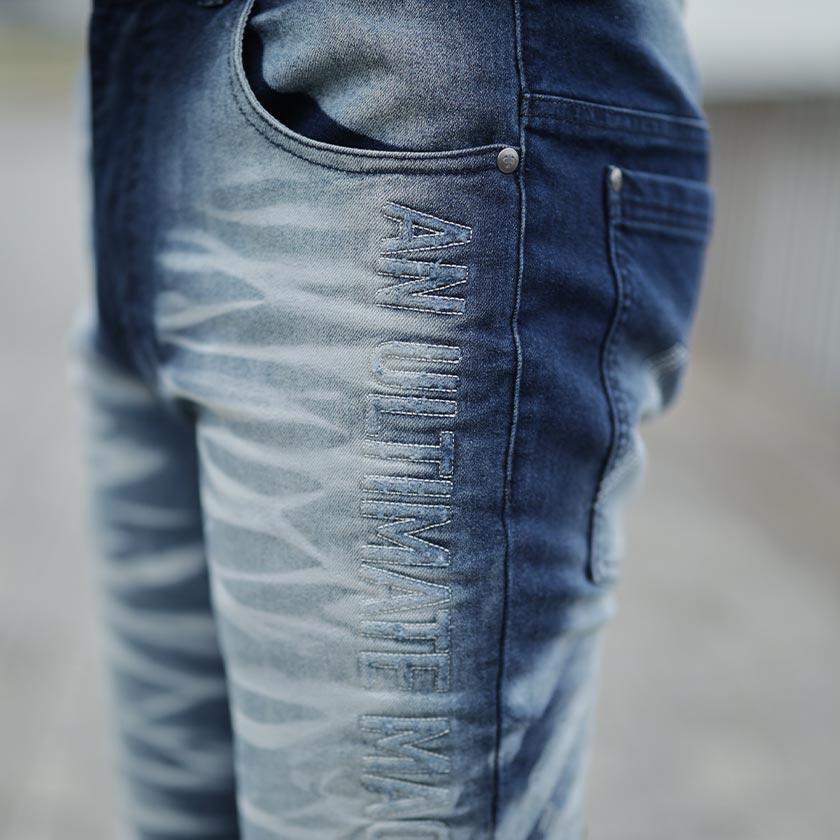 Norton ノートン デニムパンツ ストレッチ ビッグ ロゴ ヒゲ加工 Norton ノートン デニムパンツ ストレッチ ビッグ ロゴ ヒゲ加工